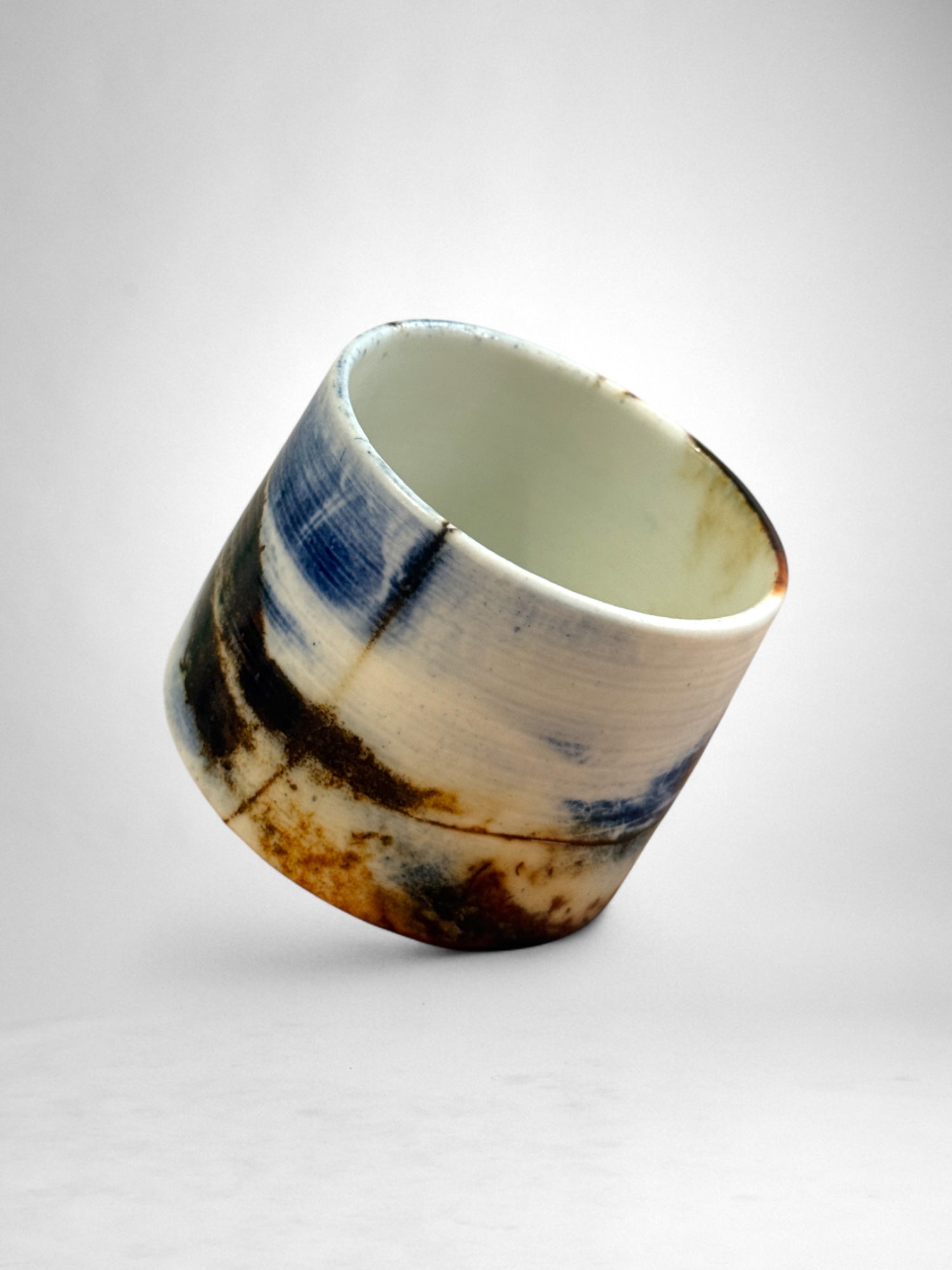 Saggar-Fired Porcelain Cup – Midnight Storm (2)