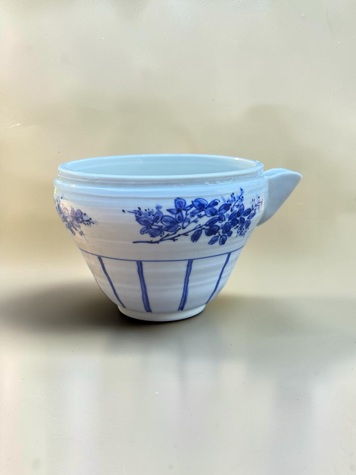 Nishihara Akira pouring bowl with floral motif