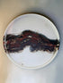 Echoes of Fire nesting plates, saggar-fired porcelain, three nested together